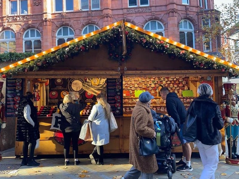 The annual Christmas Market has been to be redesigned this year and has taken over whole city centre with three 'outdoor bar areas'. Pictured is one stall on Lands Lane.