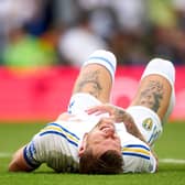 POSITIVE THINKING: From Leeds United Liam Cooper who has revealed initial fears that his injury suffered against Cardiff City, above, was actually much worse. 
Photo by Alex Caparros/Getty Images.