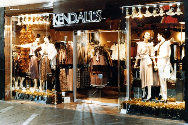 The window display of ladies fashions on sale at Kendall's in Trinity Street Arcade in March 1979. Four mannequins, lit by spotlighting and reflected in mirrored glass, are dressed in styles of the late 1970s.