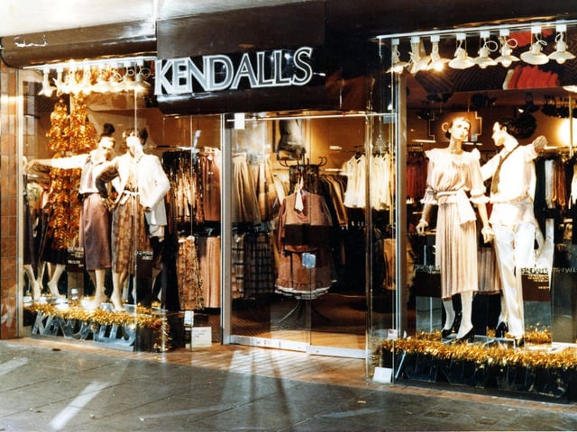 The window display of ladies fashions on sale at Kendall's in Trinity Street Arcade in March 1979. Four mannequins, lit by spotlighting and reflected in mirrored glass, are dressed in styles of the late 1970s.