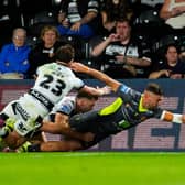 Tommy Makinson scores for Catalans Dragons in their win at Hull FC. Picture by Olly Hassell/SWpix.com.