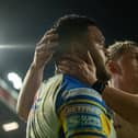 Sam Lisone, left, is congratulated by James McDonnell after scoring Rhinos' seventh try.