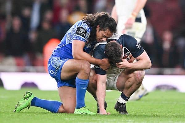 Man of the match Jarome Luai consoles England's Elliott Whitehead after the World Cup semi-final. Picture by Will Palmer/SWpix.com.