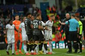 FLASH POINT - Stuart Attwell looked like a man trying to find a way out of his decision to send off Luis Sinisterra, but the Leeds United man gave him a decision to make. Pic: Jonathan Gawthorpe