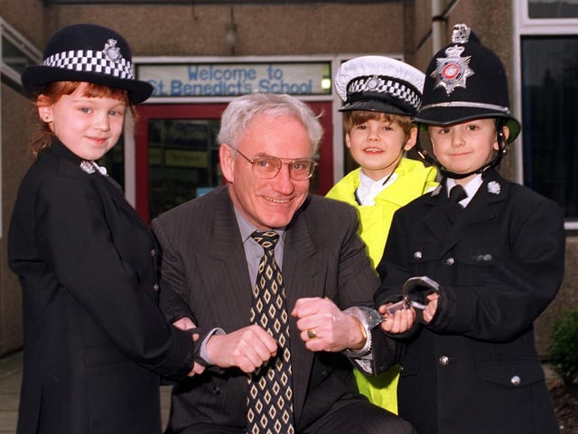 Joe McNally, headteacher at St Benedict's, Garforth is arrested by pupils Katie Booker, Jake Ramsden and Andrew Walker in January 1997.