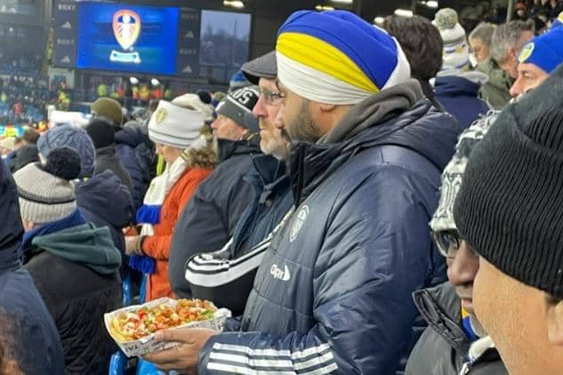 MISSION COMPLETE - Chaz Singh got his hands on loaded fries and chicken strips from the East Stand, thanks to fellow Leeds United fans and a steward.