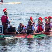 The Dragon Boat Race brings "fast and furious" action to the lake. Photo: James Hardisty.