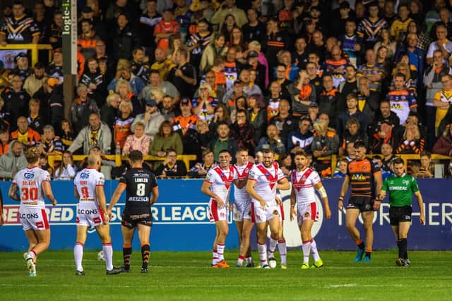 Saints celebrate their third try scored by Jon Bennison. (Photo: Bruce Rollinson)