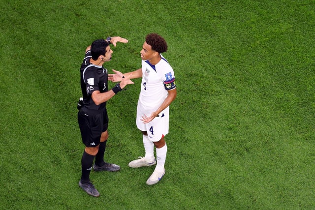 Adams remonstrates with the referee during USMNT's World Cup opener with Wales (Photo by Elsa/Getty Images)
