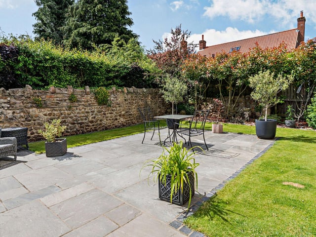 A sheltered patio, perfect for entertaining family and friends.