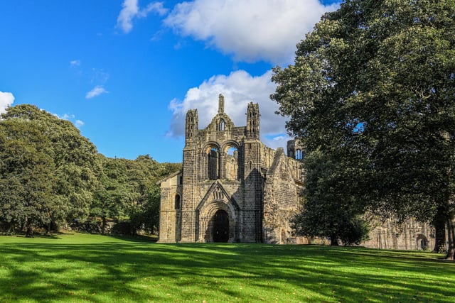 Kirkstall Abbey was founded during King Henry II's reign by a group of Catholic monks, who made a living from keeping sheep near the building for use in the wool trade.