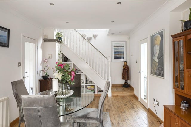 Further ground floor accommodation includes a comfortable sitting room, utility room which provides internal access to the attached double garage, and guest w.c.