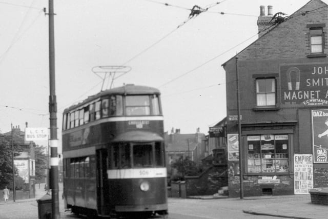 Whingate in July 1956. Tram no 506 on route 18 to Cross Gates showing pole with temporary clamp.
