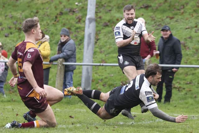 Jack Vincent scores for Stanningley in last weekend's Challenge Cup win against Dewsbury Moor. Picture by John Victor.