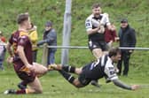 Jack Vincent scores for Stanningley in last weekend's Challenge Cup win against Dewsbury Moor. Picture by John Victor.