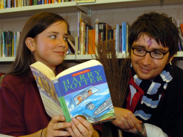 Book Week came alive at Farnley Park High School in October 2004. Pictured is pupil Genevieve Goff with teacher Matt Cullen as Harry Potter.