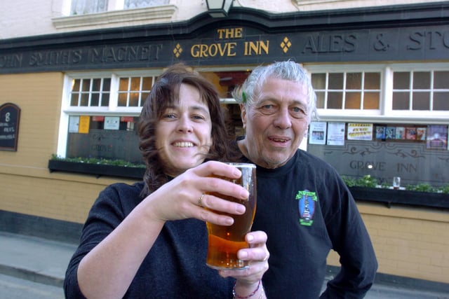 Landlady Rachel Scordos and manager John Rowe with a southern pint of beer served at The Grove pub in Holbeck as part of the Ales Around the Aire Beer festival next month. 23 December 2004.