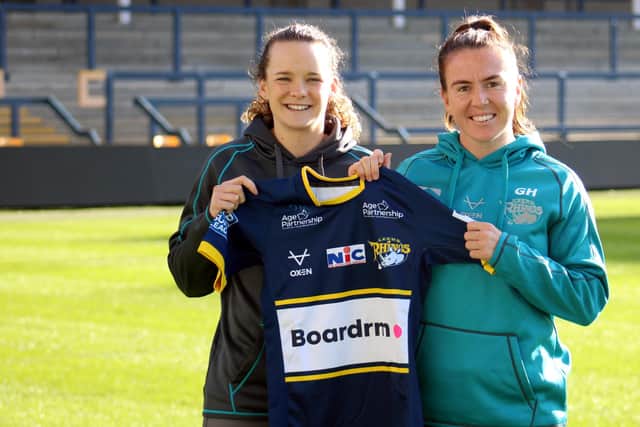 Rhinos signing Georgia Hale, right, with coach Lois Forsell. Picture by Leanne Flynn/Leeds Rhinos.