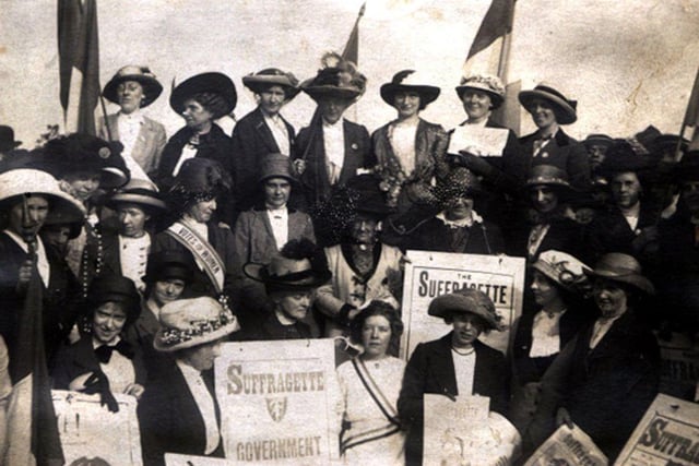 A group of women carrying placards and banners as they take part in the Women's Social & Political Union's Procession to Woodhouse Moor for a huge rally in July 1908. They began their march from Leeds Town Hall. Bands played on Woodhouse Moor where thousands of people, both men and women, had gathered to listen to the various speakers from the 10 platforms. One of the most famous of the suffragettes to address the crowds was Adela Pankhurst, daughter of Emmeline Pankhurst and sister of Sylvia and Christabel, all leaders of the British Suffrage movement.