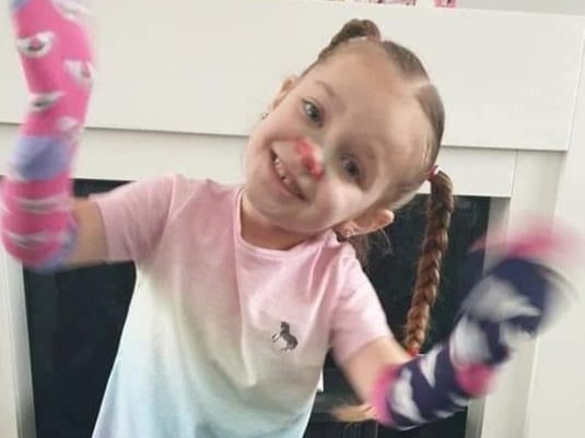 Sharlina Antcliff says: "Odd sock day and painted-on red nose at our school, but Gracie loves rainbows!"