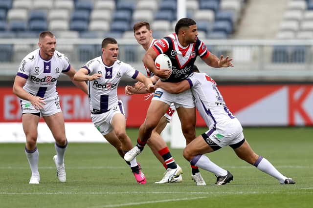Elie El-Zakhem, playing for Sydney Roosters, is tackled during an NRL Trial match against Melbourne Storm in February. Picture by Kelly Defina/Getty Images.