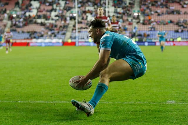 Liam Tindall scores for Leeds Rhinos at Wigan Warriors in 2023. Picture by Ed Sykes/SWpix.com.