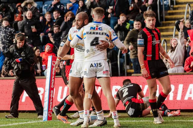 Ash Handley celebrates with his centre partner after Maika Sivo scored in Leeds Rhinos' home win against Warrington Wolves a month ago. Picture by Alex Whitehead/SWpix.com.
