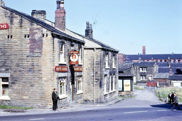 The White Horse public house in the Townend. This was an area of old settlement in Morley, part of an old road from High Street to Back Lane (Commercial Street) running in front of Frain Bros. Running at right angles to the White Horse was an old terrace of housing called Newsome Square demolished in the late 1960s while behind the pub was an even older area called The Orchard which included Wordsworth Square, Halstead Square etc. which was demolished during the 1930s.