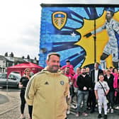 The new Jermaine Beckford mural at Edmund House Club, Pontefract Lane East End Park, Leeds with local youngsters and Saxton FC. At the front is Jonny Nixon, lead coach at Saxton FC session for both Saxton FC and Leeds United Foundation Kicks Programme, and Adele Kendrew, secretary at Edmund House Club. (pic by Steve Riding)