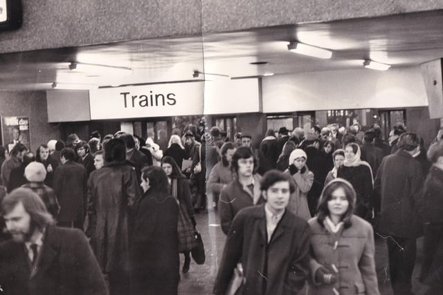 Passengers wait hopefully for trains at Leeds City Station in January 1972.