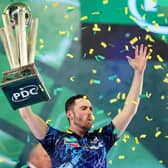 TROPHY PARADE - Luke Humphries lifts the trophy after winning the 2023/24 Paddy Power World Darts Championship final against Luke Littler. Humphries will parade his trophy at Elland Road when Leeds United host Preston North End on Sunday. Pic: Tom Dulat/Getty Images)