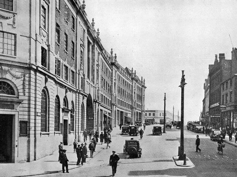 The completion of the re-development and widening of The Headrow looking east. The white Portland stone building on the left is Permanent House, the headquarters of Leeds Permanent Building Society. It was opened on May 15, 1930 by Sir Reginald Blomfield and was the first building to be completed in the new scheme for The Headrow.
