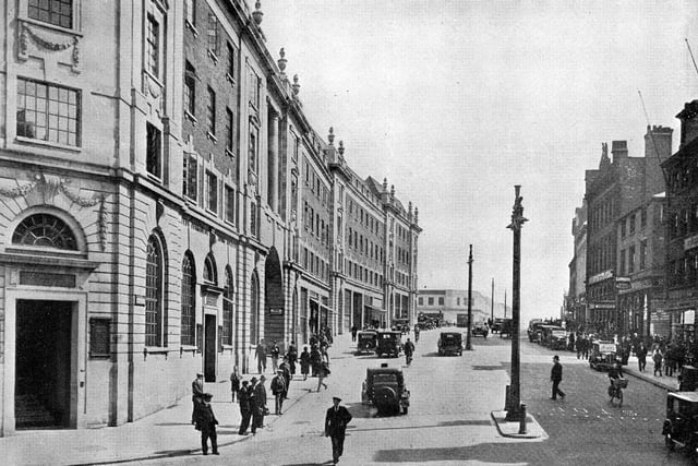 The completion of the re-development and widening of The Headrow looking east. The white Portland stone building on the left is Permanent House, the headquarters of Leeds Permanent Building Society. It was opened on May 15, 1930 by Sir Reginald Blomfield and was the first building to be completed in the new scheme for The Headrow.