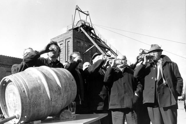 The closure of Primrose Hill Colliery in Swillington in March 1970 was marked with barrels of free beer for the miners. George Prince, the colliery manager C Shaw and training officer Jack Kielty enjoyed a drink with the miners who had worked their last shift. The previous week the pit had broken the record for production.