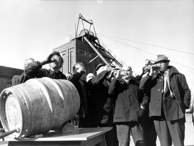 The closure of Primrose Hill Colliery in Swillington in March 1970 was marked with barrels of free beer for the miners. George Prince, the colliery manager C Shaw and training officer Jack Kielty enjoyed a drink with the miners who had worked their last shift. The previous week the pit had broken the record for production.