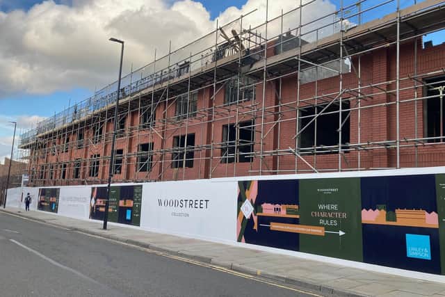 Rushbond is delivering 63 homes by converting the old Wood Street police station into apartments and building townhouses on former council-owned car parks at Rishworth Street (pictured) and Gills Yard. LDRS image