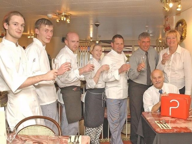 Bella Roma restaurant worker Agustin Esteva was going be on TV show Deal Or No Deal! His colleagues L to R Sean Lloyd, Keith Woolley, Darren Marston, Andrea Mudd, Andy Agar, Colin and Joyce Chew wishing him luck.