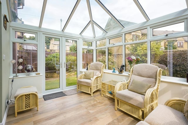 The house is extended with a conservatory which leads into private enclosed rear garden.
