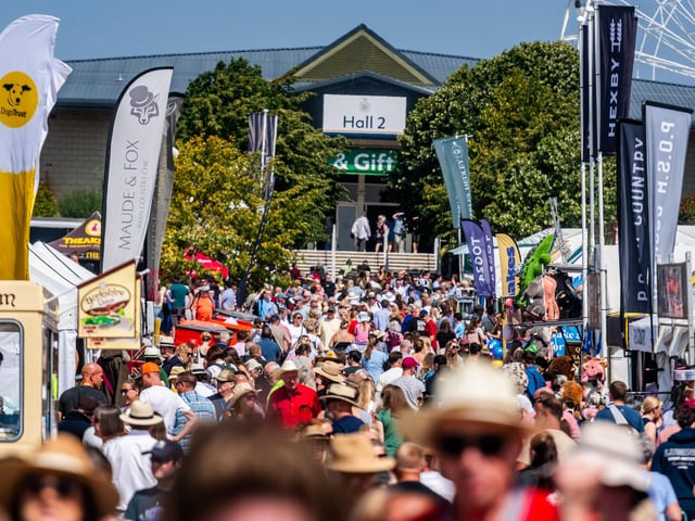 Thousands of visitors soaking up the glorious sunshine while enjoying everything the show has to offer
