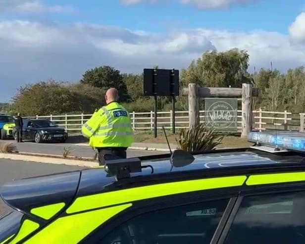 The scene at Yorkshire Wildlife Park which has been evacuated and closed due to an ongoing emergency incident - with a huge police and paramedic presence at the site.  Charley Atkins / SWNS