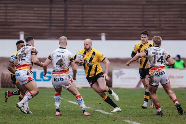 Liam Watts on the ball for Castleford Tigers during last season's Challenge Cup defeat at Bradford Bulls. Picture by Alex Whitehead/SWpix.com.