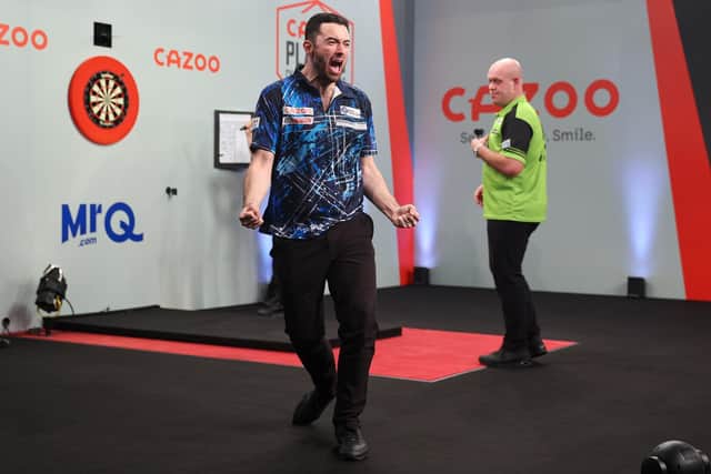 Leeds United fan Luke Humphries celebrates after beating Michael Van Gerwen to win last month's Cazoo Players Championship Finals. Picture by Kieran Cleeves/PDC.