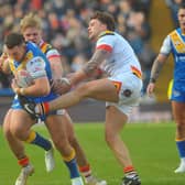 Cameron Smith on the ball for Leeds Rhinos in his testimonial game against Bradford Bulls. Picture by Steve Riding.