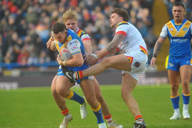 Cameron Smith on the ball for Leeds Rhinos in his testimonial game against Bradford Bulls. Picture by Steve Riding.