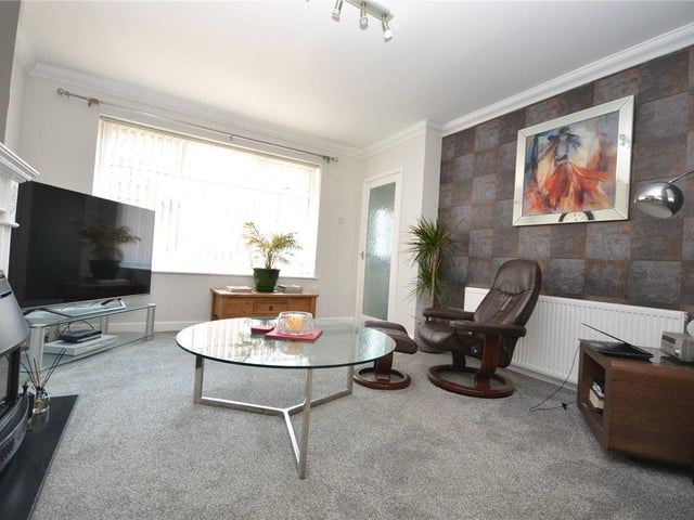 The open plan lounge flows beautifully into the kitchen.