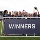 Leeds Rhinos Development Academy celebrate after beating Halifax in the girls' college final at Wakefield Trinity. Picture by John Victor.