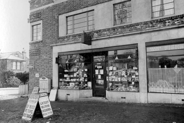 Grange Park Parade Sub Post office at 134 Dib Lane. Grange Park Avenue can be seen on the left Grange Park fisheries proprietor Walter Hewitt is at 132 Dib Lane. Pictured in  April 1936.