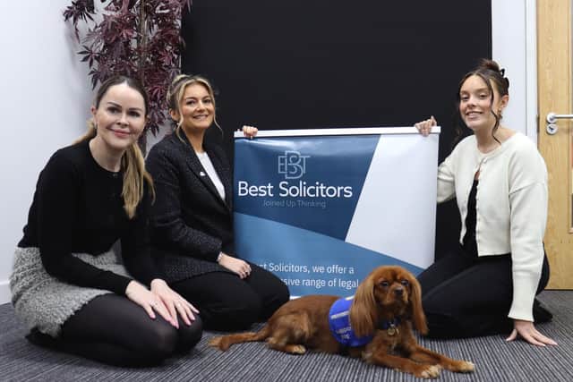 Trainee support dog Tevye with Best Solicitors staff (left to right) Anne Rogers, Ellie Whitehead and Alicia Mate