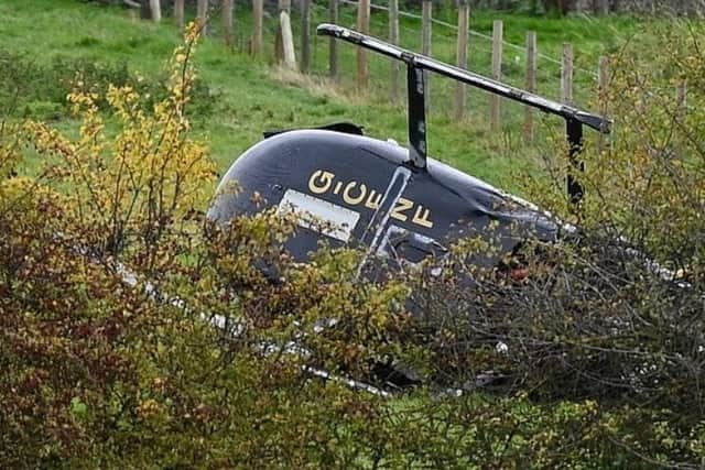The helicopter which crashed in a field near Bentley this morning. (Photo: SWNS).