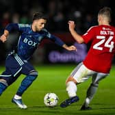 EXCITEMENT: From Sam Greenwood, left, at his loan switch to Middlesbrough, the Leeds United player pictured taking on Salford City's Luke Bolton in last month's Carabao Cup tie. Photo by Jess Hornby/Getty Images.